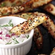 Toaster oven baked potato wedges are crispy outside, creamy inside and way better than takeout. Toss with everything bagel seasoning for the ultimate appetizer or midnight snack