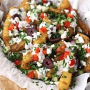 Toaster oven Greek fries are the appetizer to get your party started. The flavorful seasoning and toppings are addictive.