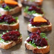 Up your cheese and crackers game with Balsamic Roasted Cranberries. Spread crispy toasted bread slices with goat cheese. Top with arugula or kale and a heaping teaspoon of balsamic roasted cranberries.