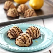 Chocolate Dipped Lemon Macaroons. Add a little zest to your holiday cookie box with these lemony vegan macaroons. Egg-free and made with whole wheat flour, almond meal and naturally sweetened with maple syrup. The bright lemon flavor pairs perfectly with the sweet coconut and chocolate.