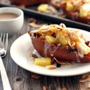 Pineapple Coconut Twice-Baked Sweet Potatoes. Toaster oven sweet potatoes baked to perfection, topped with juicy pineapple and toasted coconut. Treat yourself to these rich and creamy dairy-free twice-baked sweet potatoes today!