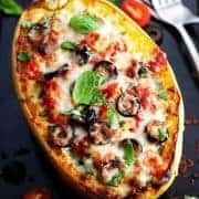 Veggie Pizza Spaghetti Squash Boats are serious comfort food that’s secretly wholesome. Toaster oven roasted spaghetti squash stuffed with ricotta and kale then covered in your favorite vegetarian pizza toppings.