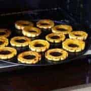 Roasted slices of delicata squash in a toaster oven