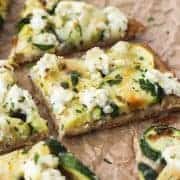 Piece of broiled zucchini and lemon flatbread
